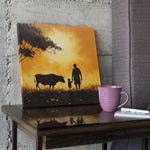 Load image into Gallery viewer, Sunset Bonds: Silhouette of Farmer, Son, and their Cow | Digital Printed Canvas
