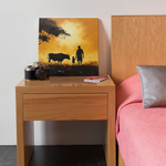 Load image into Gallery viewer, Sunset Bonds: Silhouette of Farmer, Son, and their Cow | Digital Printed Canvas
